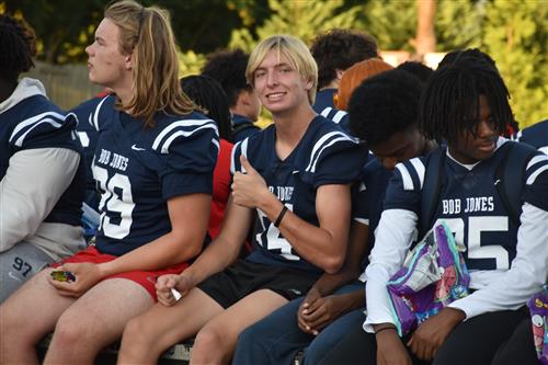 closeup of football players on float in their jerseys